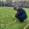 Matt laying a cross in the Westminster remembrance garden